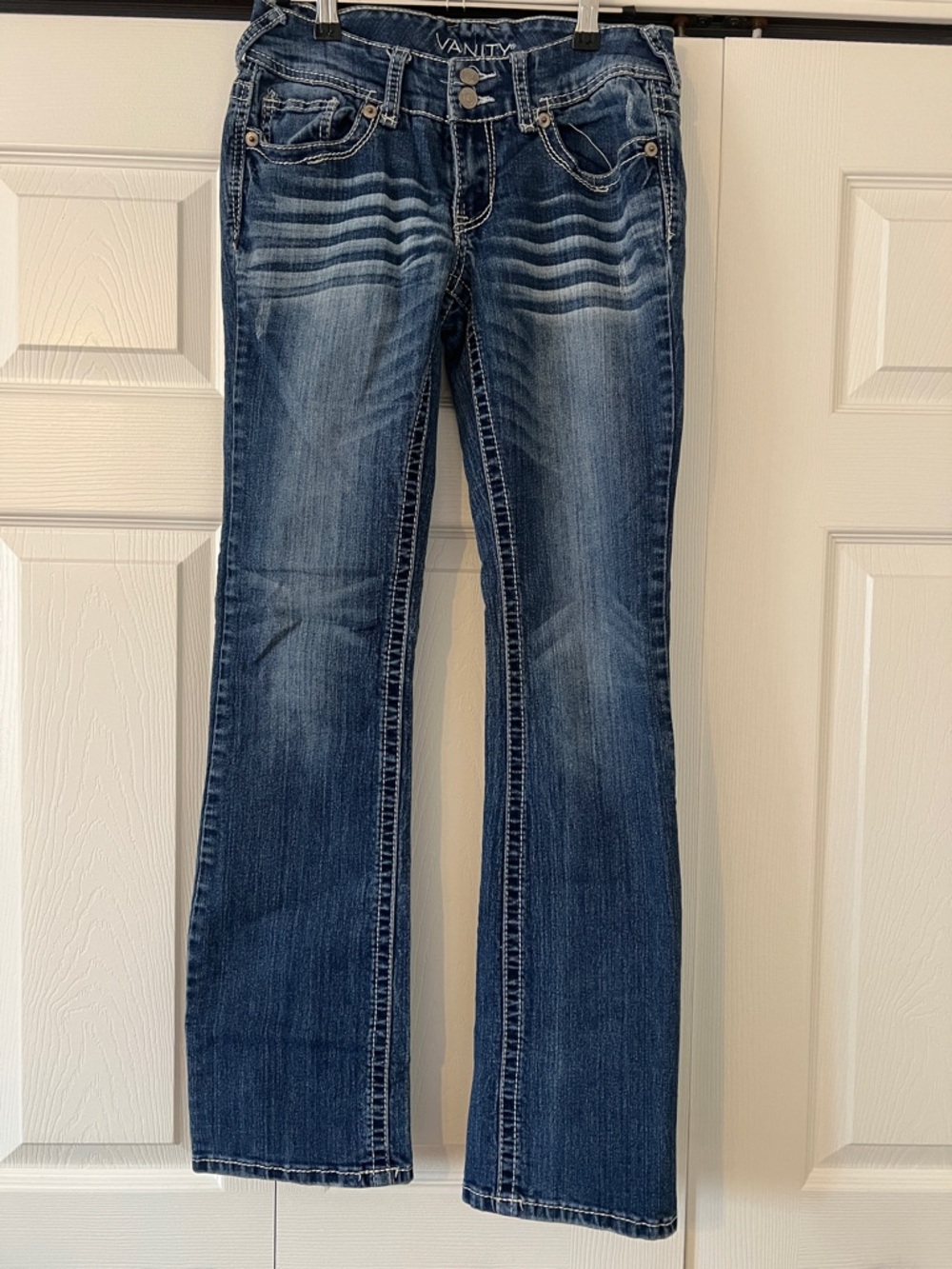 Vanity Mid Wash Flare Jeans in Dark Blue with Fading